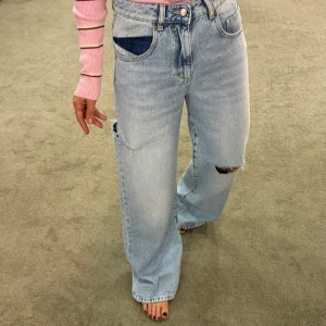 Jeans poppy sky con tagli Icon