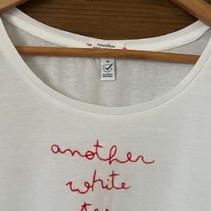ANOTHER WHITE TEE – M WOMAN BIO